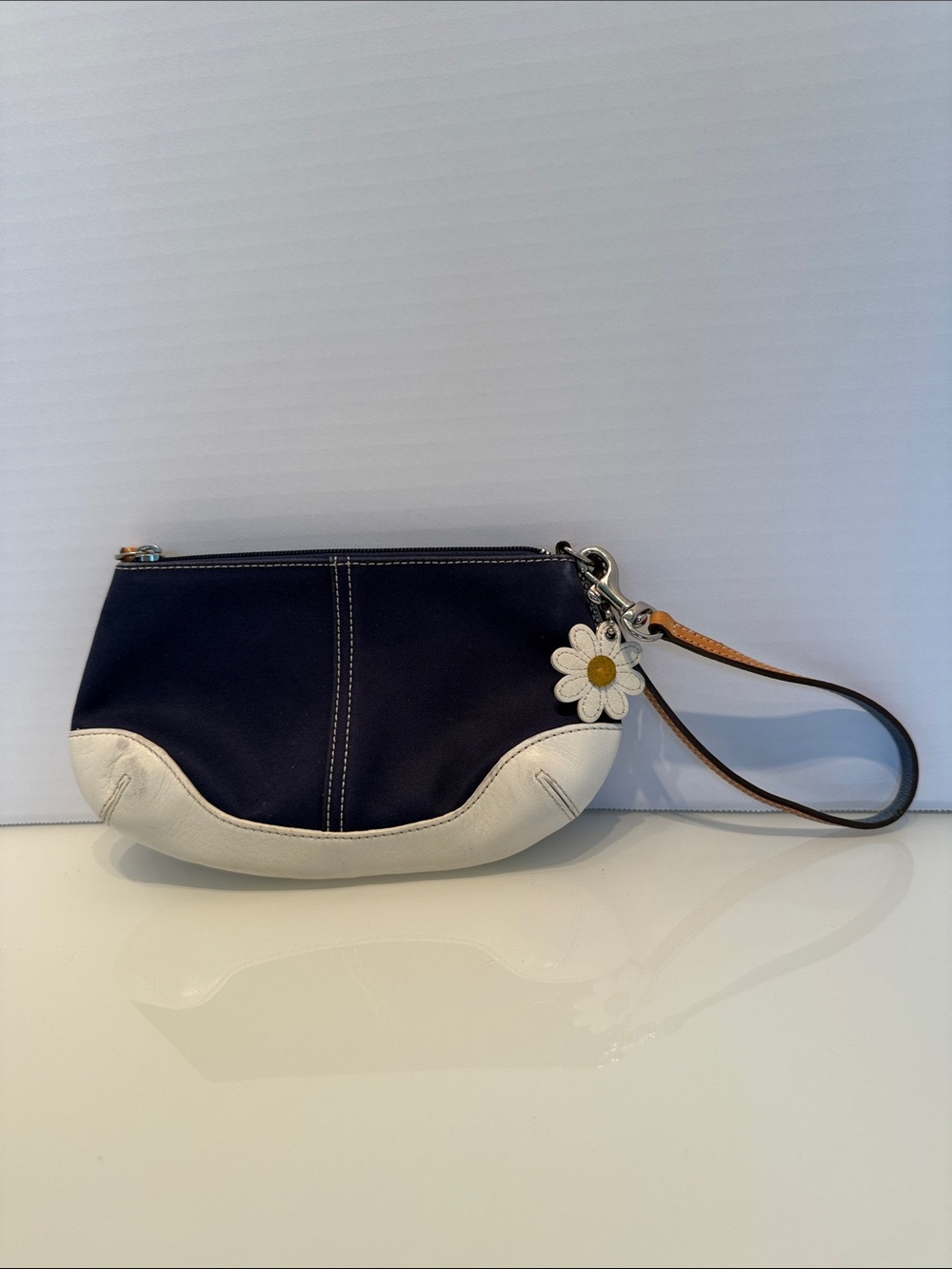 Coach Navy and White Wristlet with Daisy Charm
